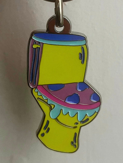 Porté-clés toilettes "Les larmes des ouin-ouins" en émail avec attache métal